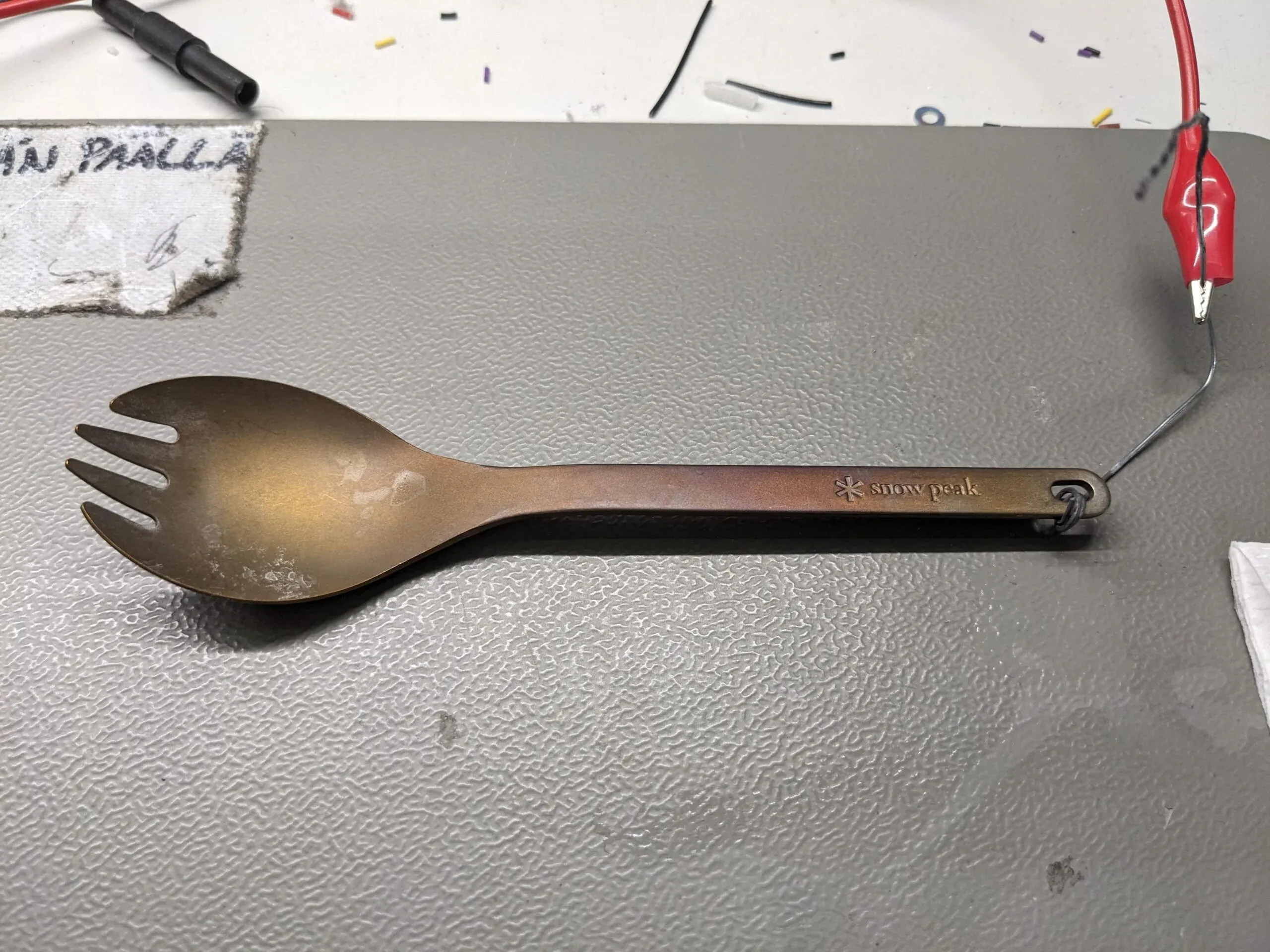 A gold/copper coloured spork